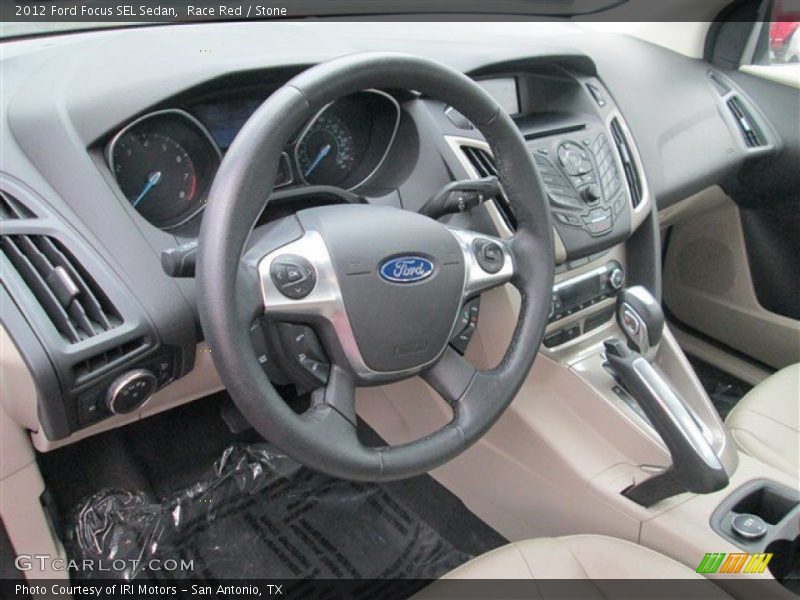 Race Red / Stone 2012 Ford Focus SEL Sedan