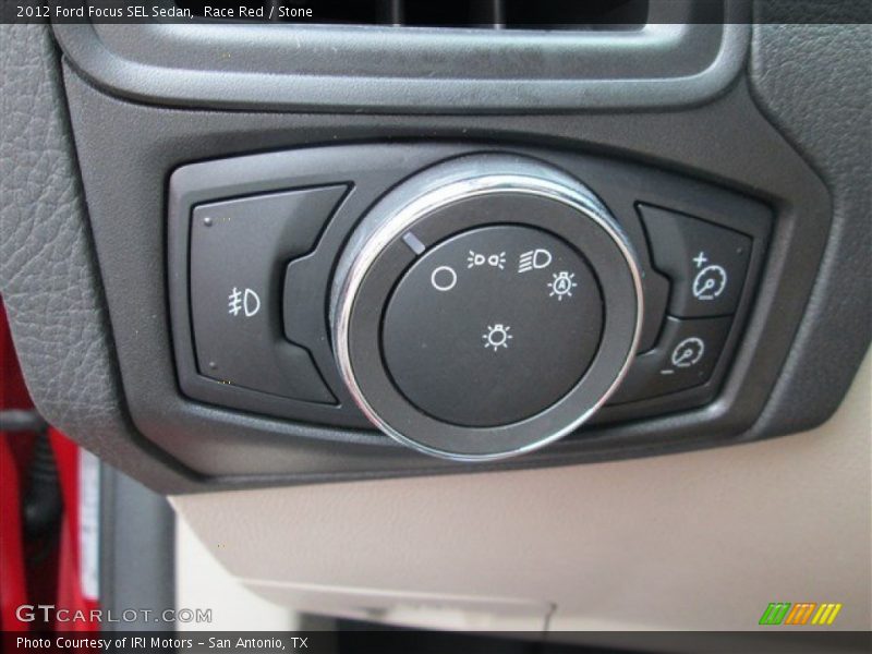 Race Red / Stone 2012 Ford Focus SEL Sedan