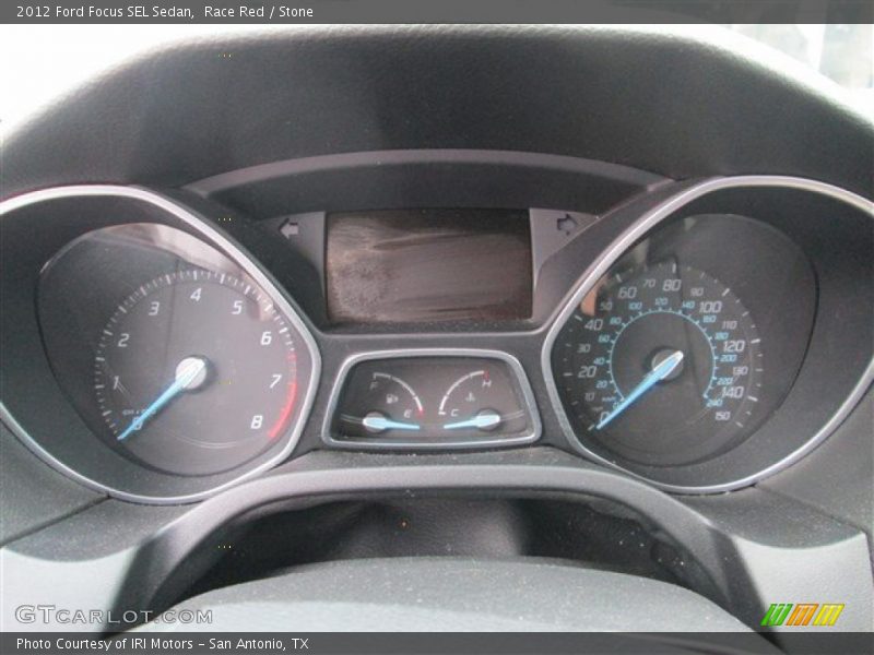 Race Red / Stone 2012 Ford Focus SEL Sedan