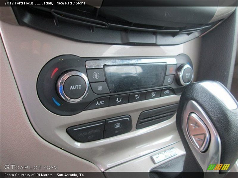 Race Red / Stone 2012 Ford Focus SEL Sedan