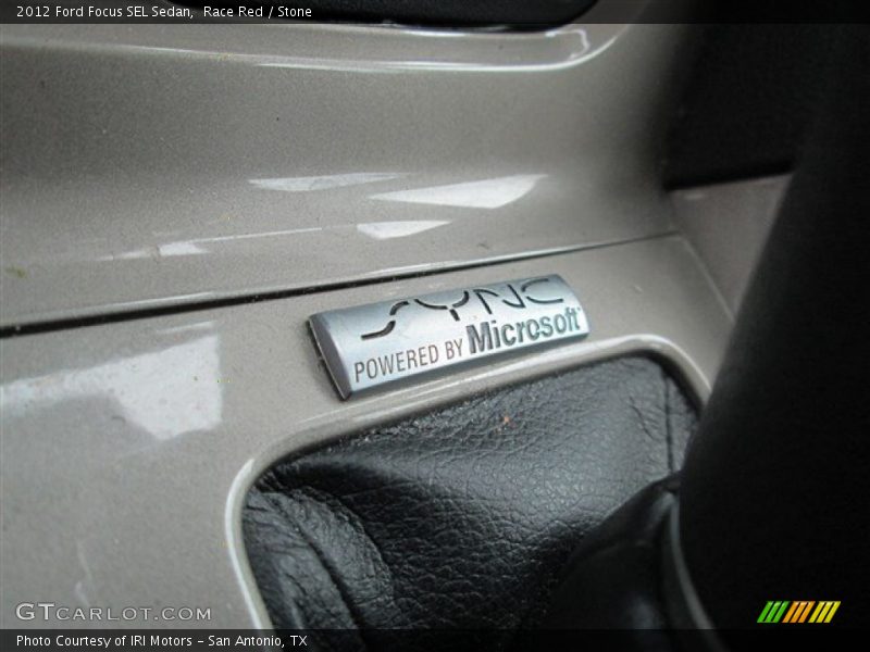 Race Red / Stone 2012 Ford Focus SEL Sedan