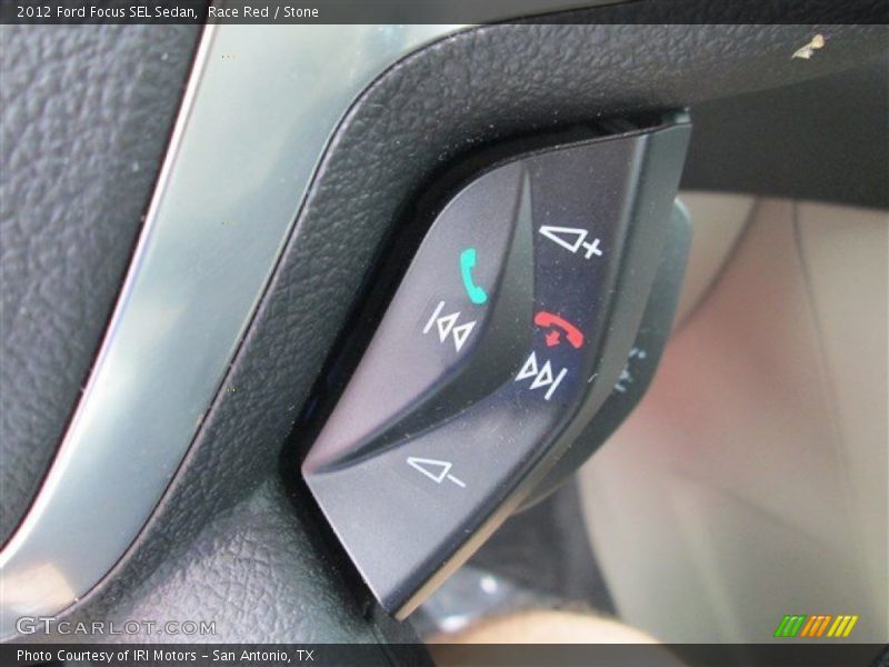 Race Red / Stone 2012 Ford Focus SEL Sedan