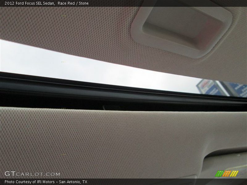 Race Red / Stone 2012 Ford Focus SEL Sedan