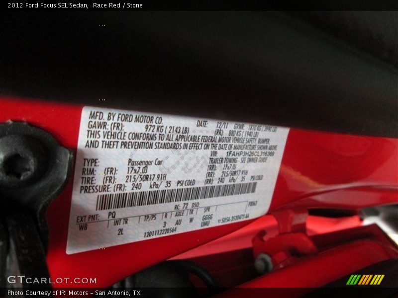 Race Red / Stone 2012 Ford Focus SEL Sedan