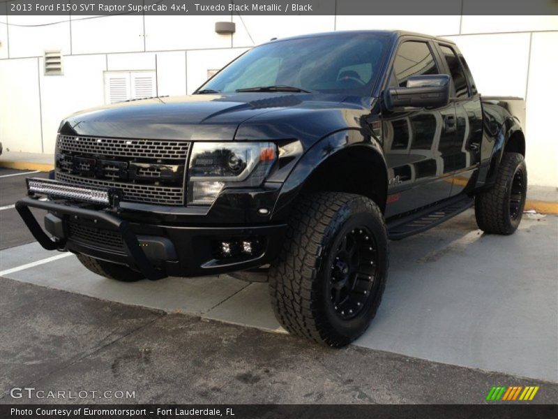 Front 3/4 View of 2013 F150 SVT Raptor SuperCab 4x4