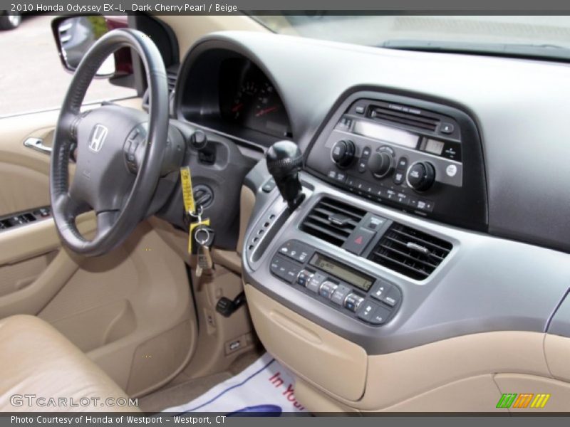 Dark Cherry Pearl / Beige 2010 Honda Odyssey EX-L