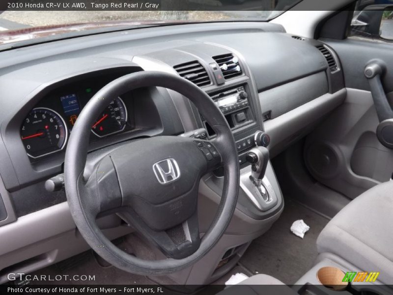 Tango Red Pearl / Gray 2010 Honda CR-V LX AWD