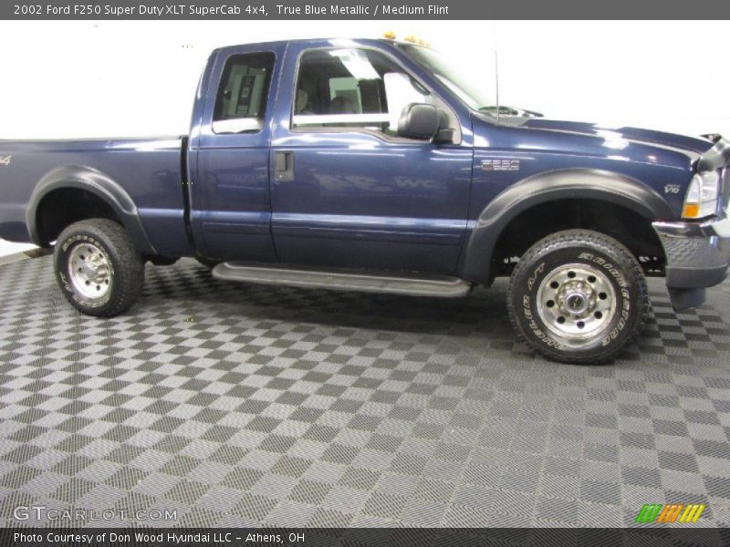 True Blue Metallic / Medium Flint 2002 Ford F250 Super Duty XLT SuperCab 4x4