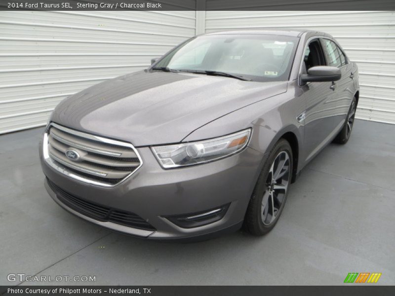 Front 3/4 View of 2014 Taurus SEL