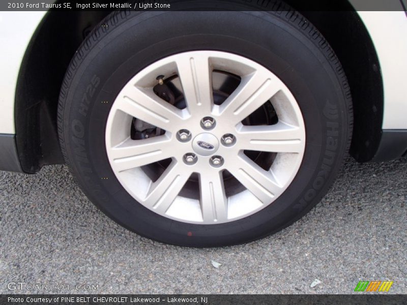 Ingot Silver Metallic / Light Stone 2010 Ford Taurus SE
