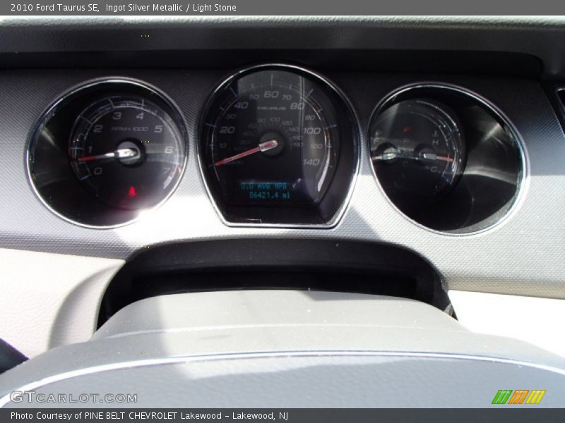 Ingot Silver Metallic / Light Stone 2010 Ford Taurus SE