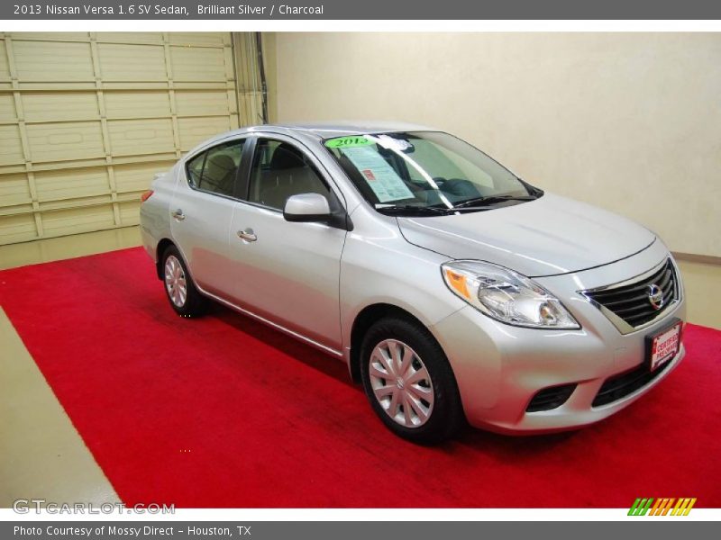Brilliant Silver / Charcoal 2013 Nissan Versa 1.6 SV Sedan