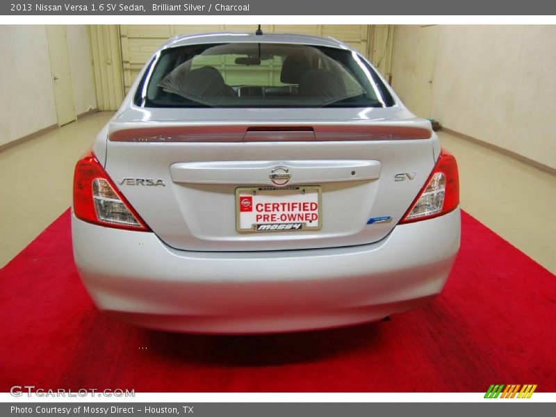Brilliant Silver / Charcoal 2013 Nissan Versa 1.6 SV Sedan