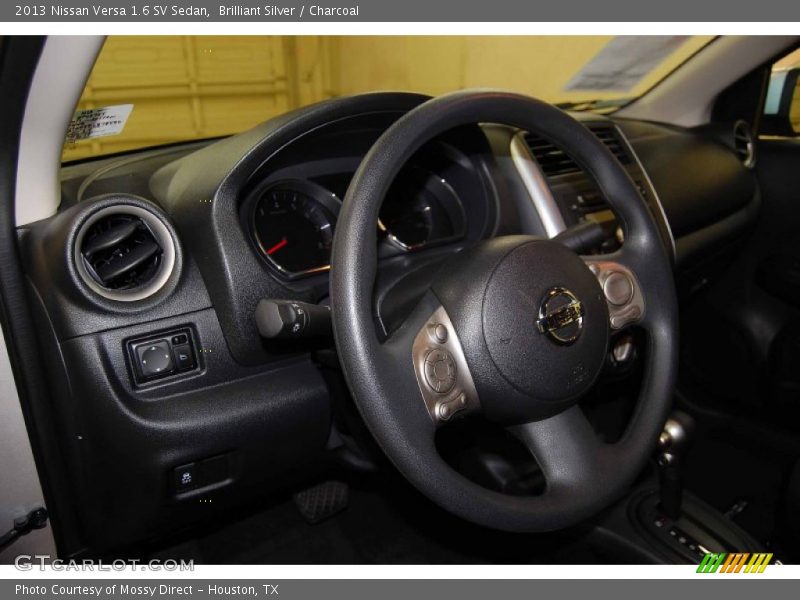 Brilliant Silver / Charcoal 2013 Nissan Versa 1.6 SV Sedan