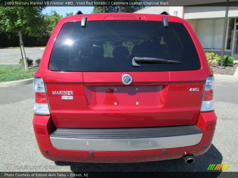 Vivid Red Metallic / Cashmere Leather/Charcoal Black 2009 Mercury Mariner V6 Premier 4WD