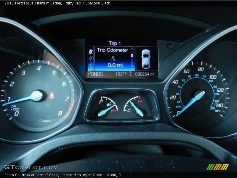 Ruby Red / Charcoal Black 2013 Ford Focus Titanium Sedan