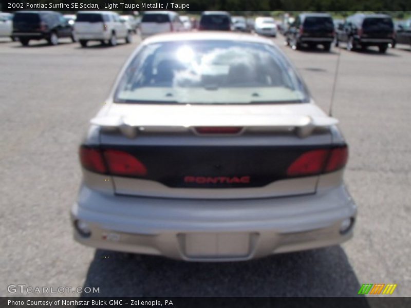 Light Taupe Metallic / Taupe 2002 Pontiac Sunfire SE Sedan