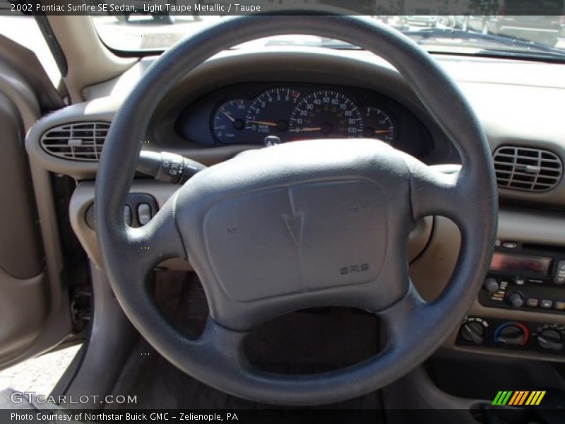 Light Taupe Metallic / Taupe 2002 Pontiac Sunfire SE Sedan