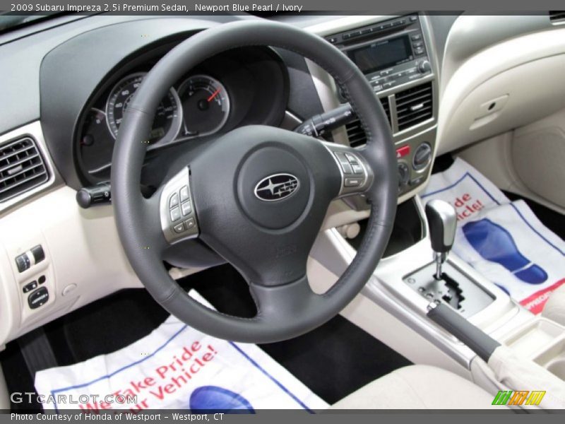 Newport Blue Pearl / Ivory 2009 Subaru Impreza 2.5i Premium Sedan