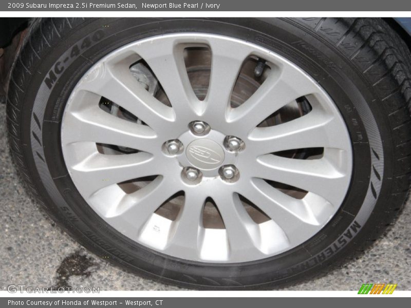 Newport Blue Pearl / Ivory 2009 Subaru Impreza 2.5i Premium Sedan