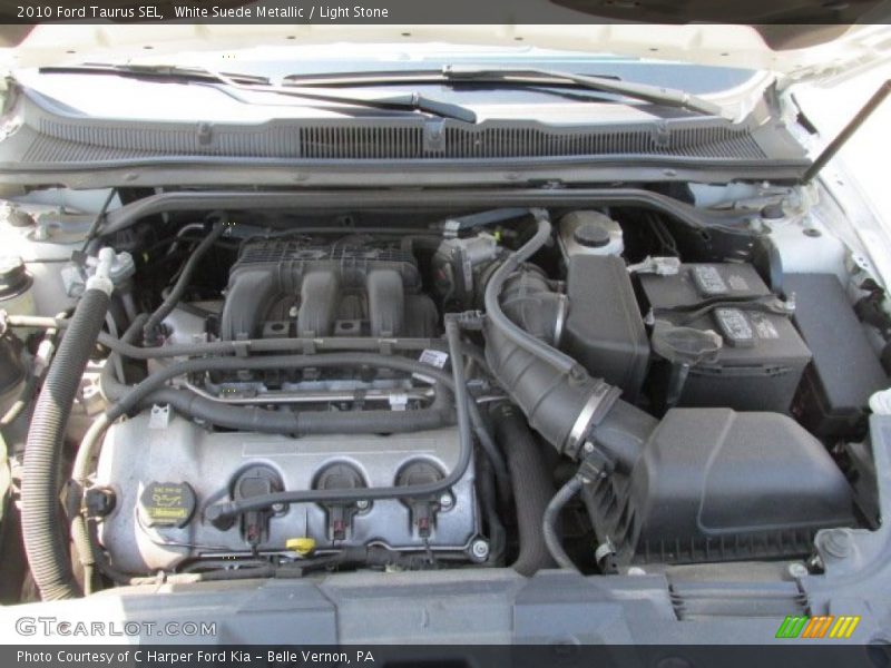 White Suede Metallic / Light Stone 2010 Ford Taurus SEL