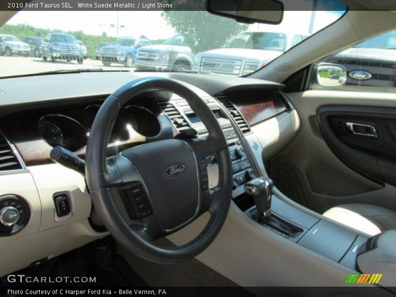 White Suede Metallic / Light Stone 2010 Ford Taurus SEL