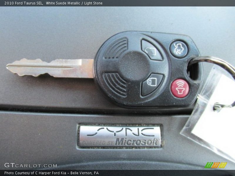 White Suede Metallic / Light Stone 2010 Ford Taurus SEL
