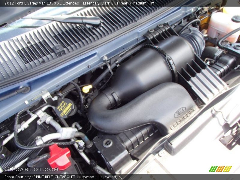 Dark Blue Pearl / Medium Flint 2012 Ford E Series Van E350 XL Extended Passenger