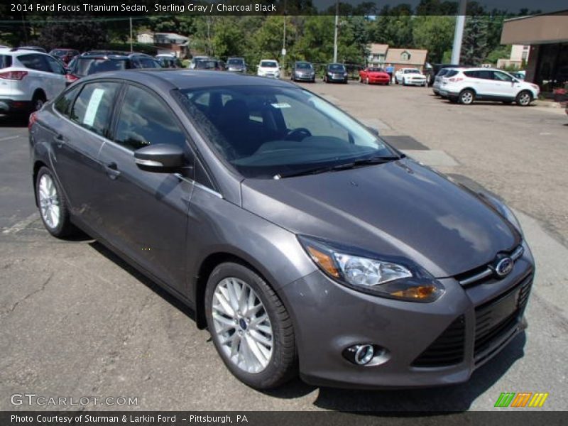 Front 3/4 View of 2014 Focus Titanium Sedan