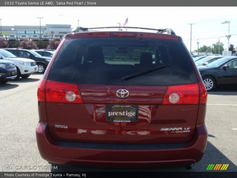 Salsa Red Pearl / Stone 2010 Toyota Sienna LE AWD