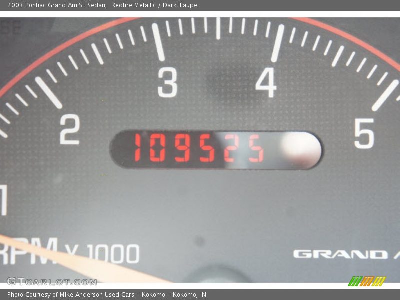 Redfire Metallic / Dark Taupe 2003 Pontiac Grand Am SE Sedan