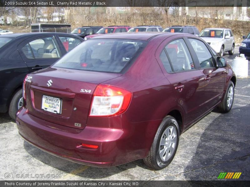 Cherry Red Metallic / Black 2009 Suzuki SX4 Sedan LE