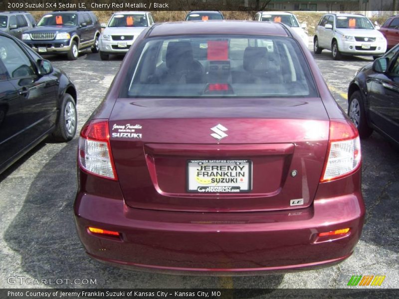 Cherry Red Metallic / Black 2009 Suzuki SX4 Sedan LE