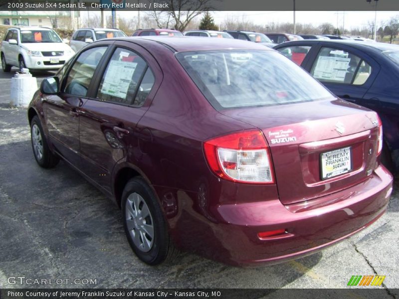 Cherry Red Metallic / Black 2009 Suzuki SX4 Sedan LE