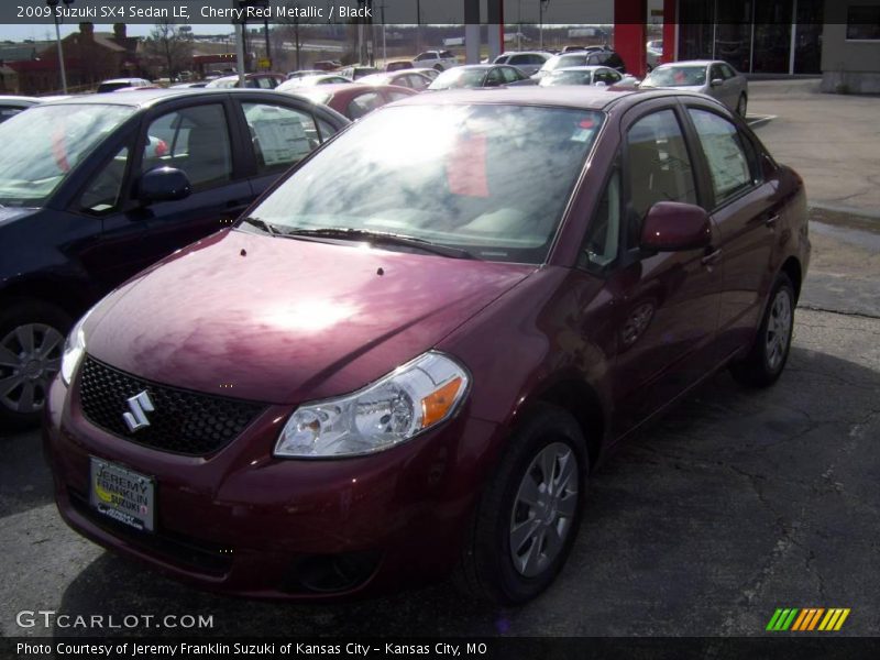 Cherry Red Metallic / Black 2009 Suzuki SX4 Sedan LE