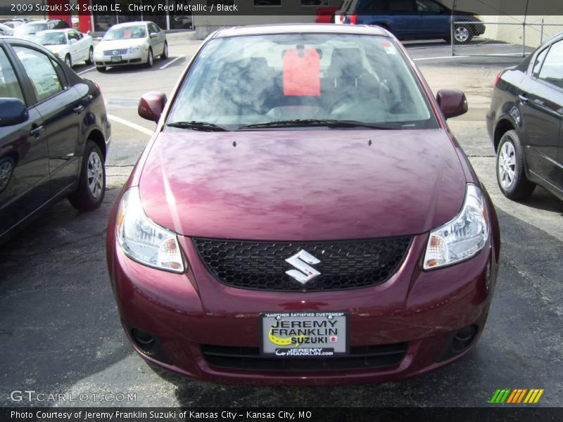 Cherry Red Metallic / Black 2009 Suzuki SX4 Sedan LE