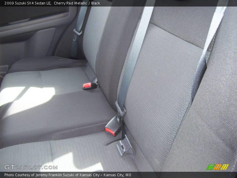 Cherry Red Metallic / Black 2009 Suzuki SX4 Sedan LE