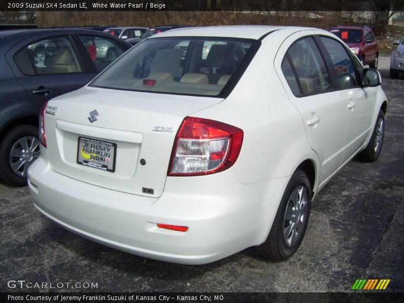 White Water Pearl / Beige 2009 Suzuki SX4 Sedan LE