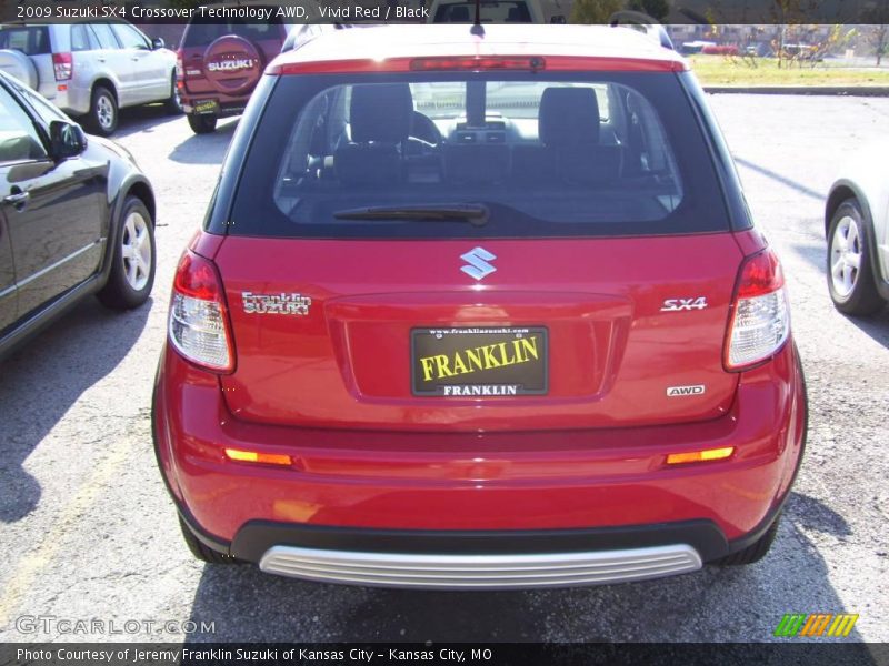 Vivid Red / Black 2009 Suzuki SX4 Crossover Technology AWD