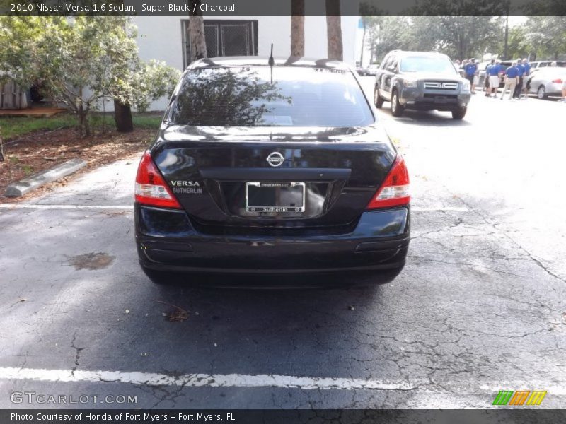 Super Black / Charcoal 2010 Nissan Versa 1.6 Sedan