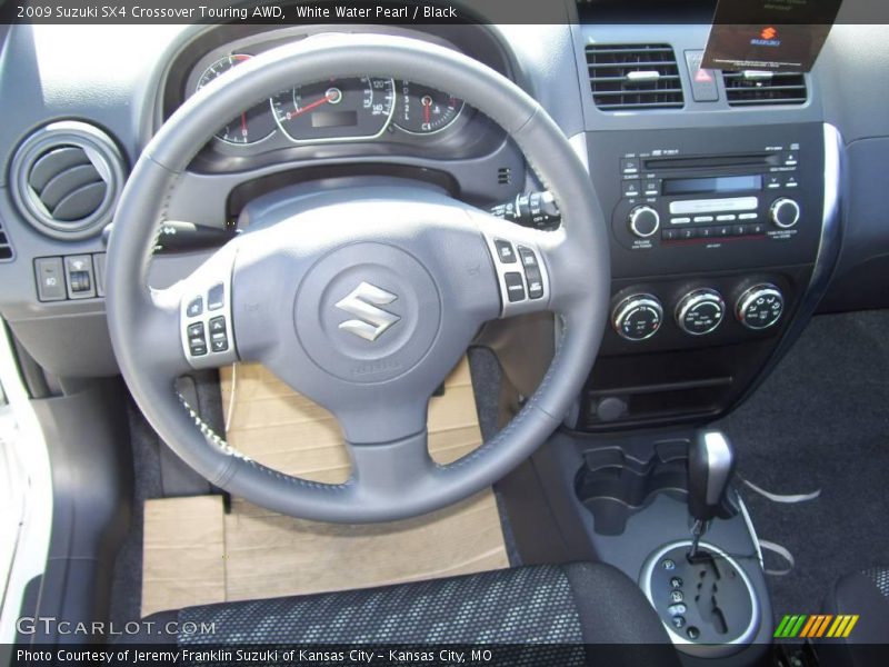 White Water Pearl / Black 2009 Suzuki SX4 Crossover Touring AWD