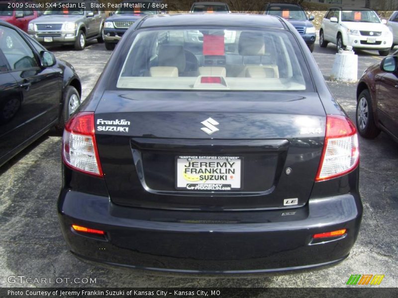 Black Pearl Metallic / Beige 2009 Suzuki SX4 Sedan LE