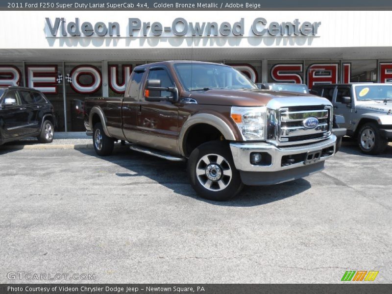 Golden Bronze Metallic / Adobe Beige 2011 Ford F250 Super Duty Lariat SuperCab 4x4