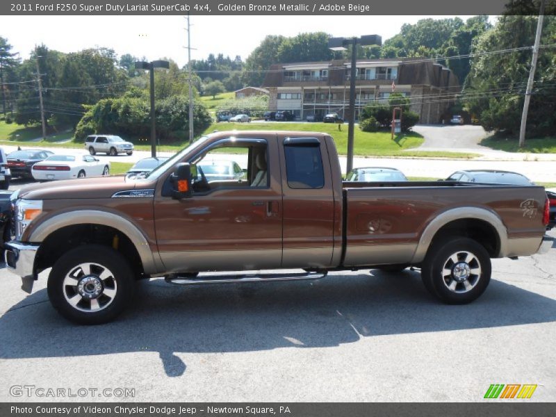 Golden Bronze Metallic / Adobe Beige 2011 Ford F250 Super Duty Lariat SuperCab 4x4