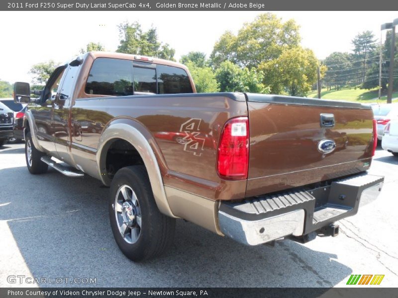 Golden Bronze Metallic / Adobe Beige 2011 Ford F250 Super Duty Lariat SuperCab 4x4