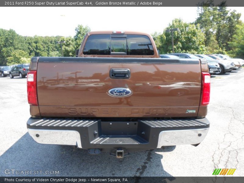 Golden Bronze Metallic / Adobe Beige 2011 Ford F250 Super Duty Lariat SuperCab 4x4