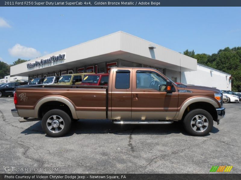 Golden Bronze Metallic / Adobe Beige 2011 Ford F250 Super Duty Lariat SuperCab 4x4