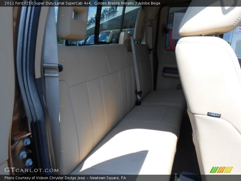 Golden Bronze Metallic / Adobe Beige 2011 Ford F250 Super Duty Lariat SuperCab 4x4