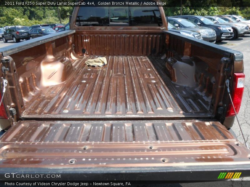 Golden Bronze Metallic / Adobe Beige 2011 Ford F250 Super Duty Lariat SuperCab 4x4