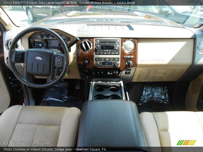 Golden Bronze Metallic / Adobe Beige 2011 Ford F250 Super Duty Lariat SuperCab 4x4